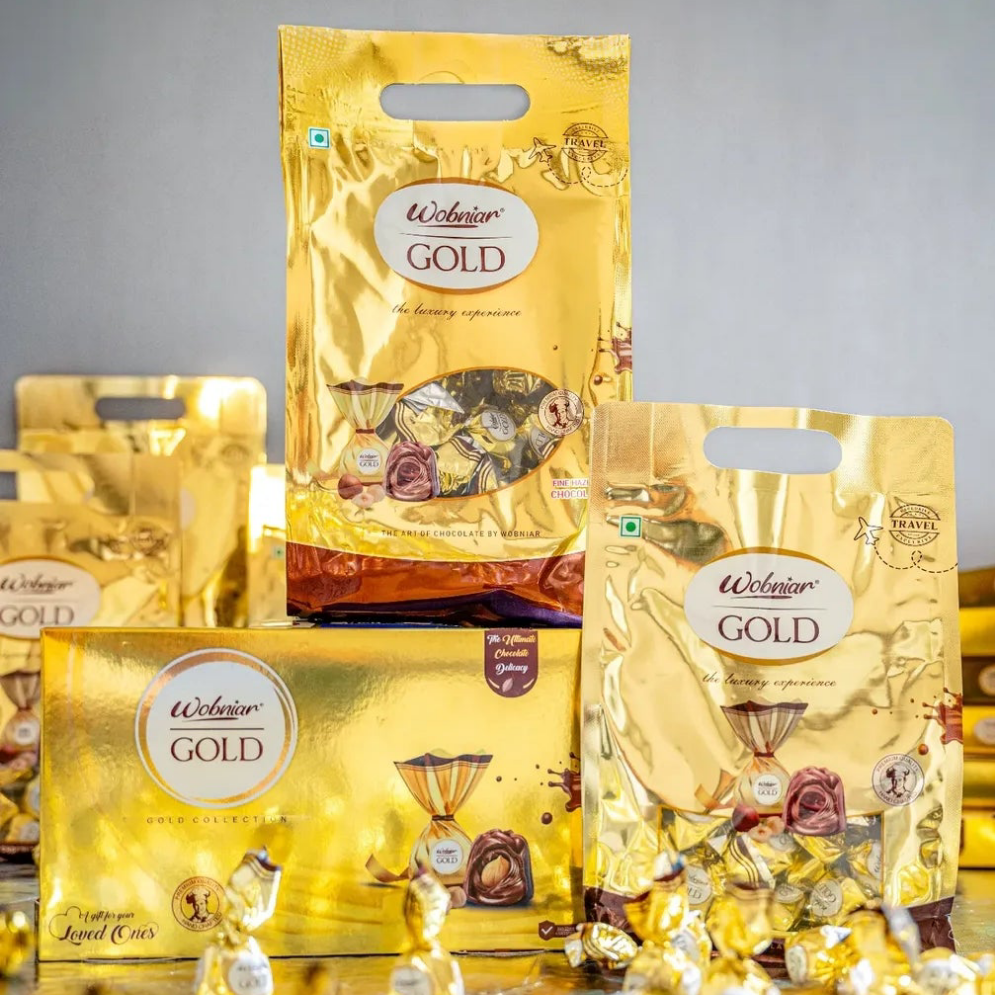 Gold packaging of Welhouse Gold products on a gray background
