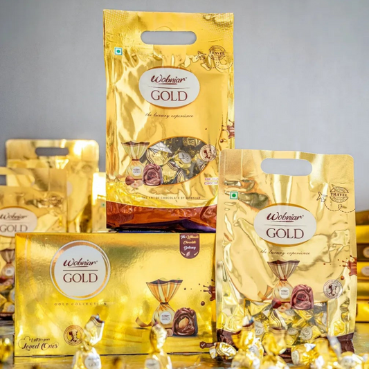 Gold packaging of Welhouse Gold products on a gray background